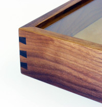 Corner of walnut flagcase